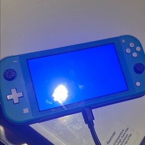 Nintendo Switch Lite Blue Handheld Console turquoise as is blue screen
